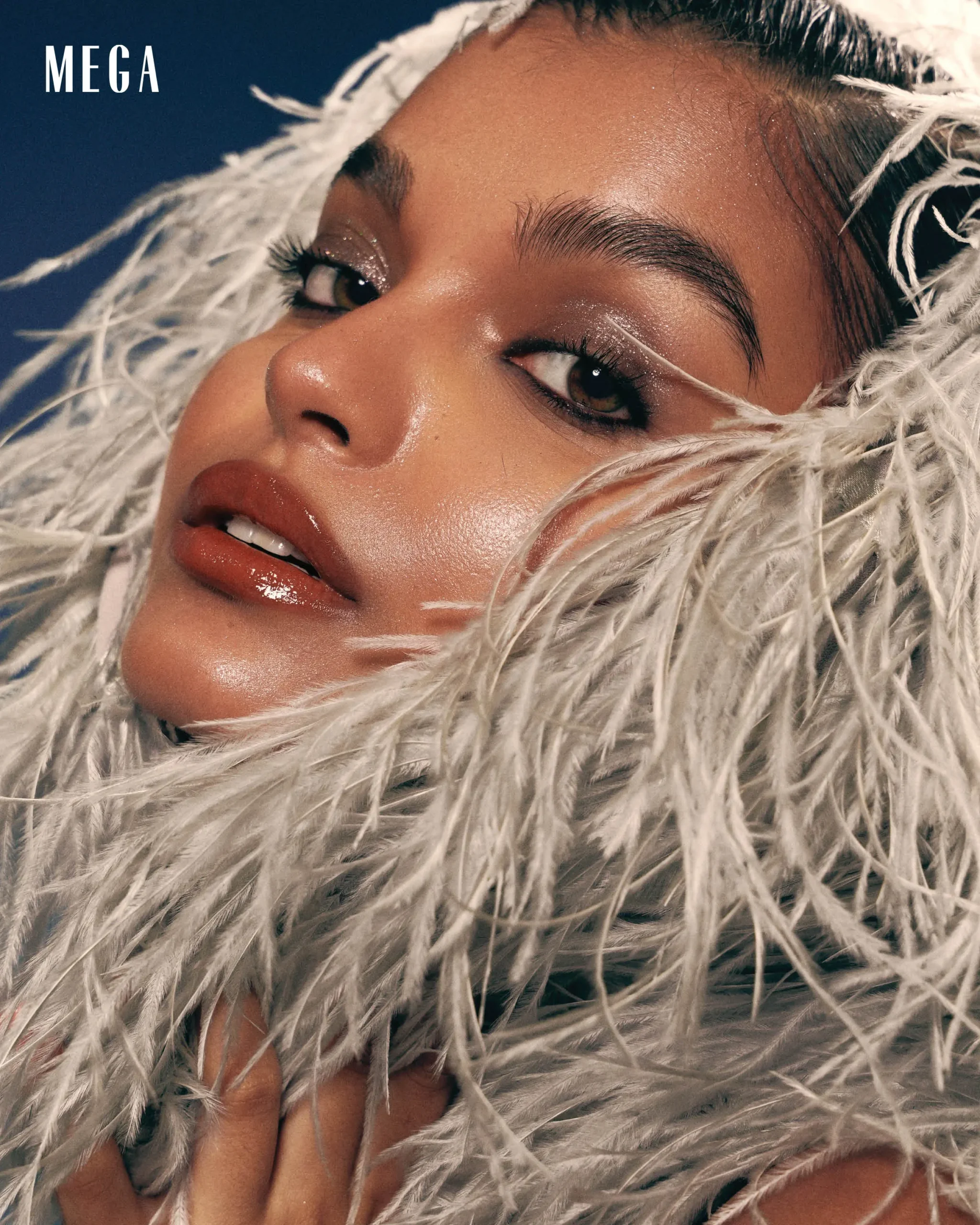 PRO TIP: Don’t shy away from wearing magic on your eyelids. Shimmered hues, especially those within the violet spectrum, flatter all skin tones effortlessly. Here, makeup artist Jason Delos Reyes paired complementary light and deep purples, blending them seamlessly from lash line to crease. A final wash of glittered lavender adds dimension and enchantment to the overall look