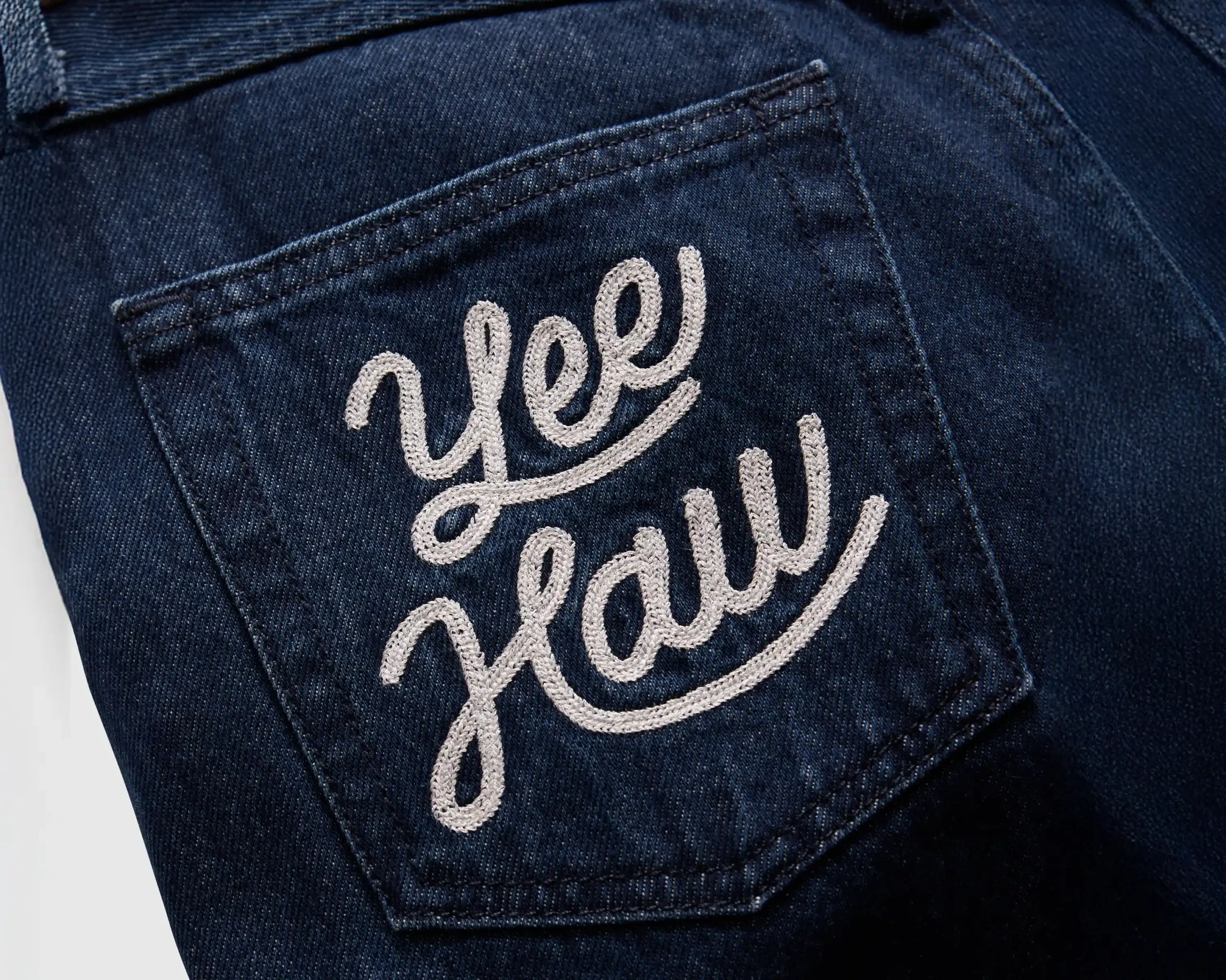 Yee Haw embroidered into the jeans