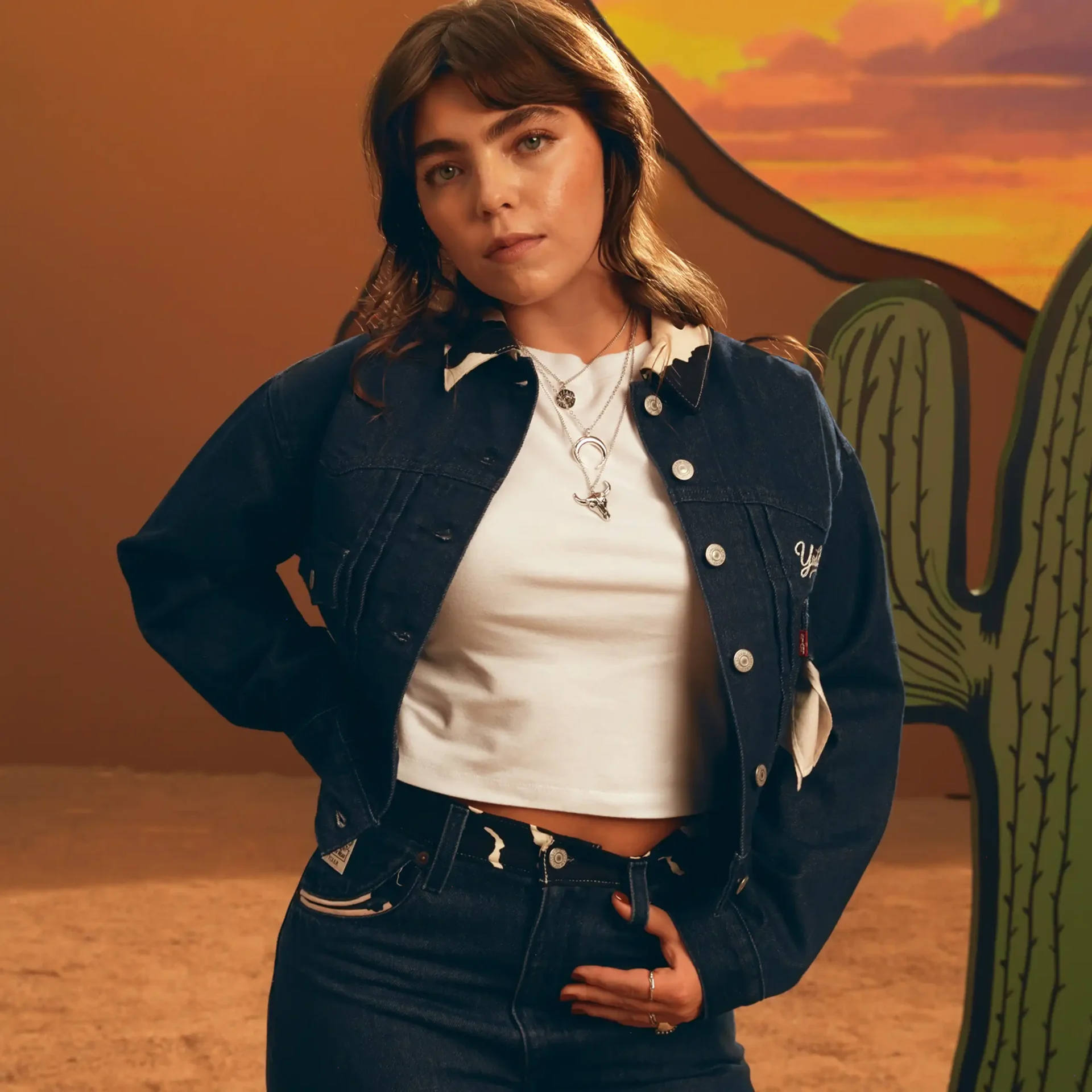 A model wearing her denim piece from the Levi's x Toy Story 30th Anniversary collection