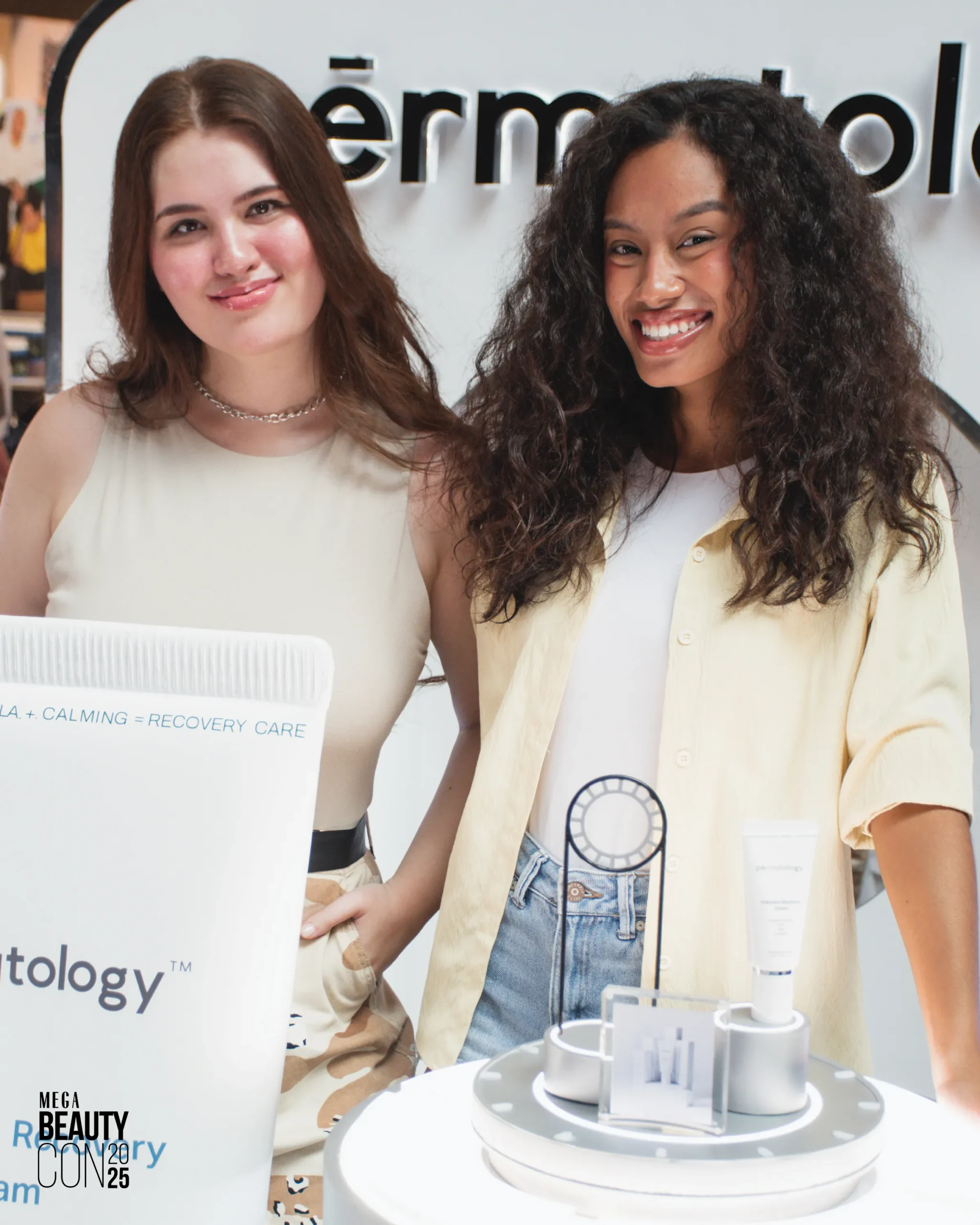 Two passengers at Pèrmatology's booth