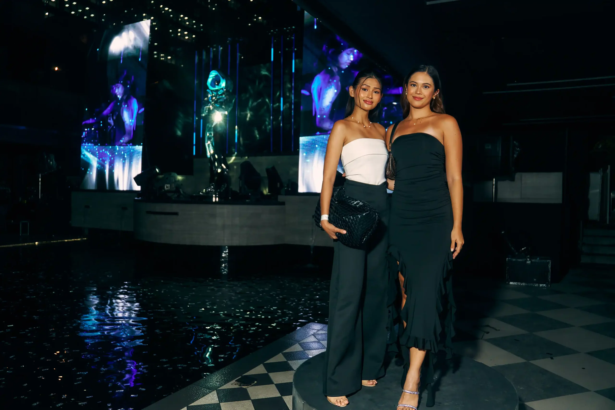 Guests posing by 'Curious Icons'
