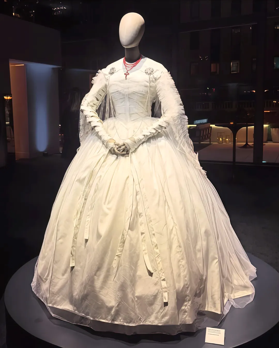THE GOWN MIRRORS THE CREATURE