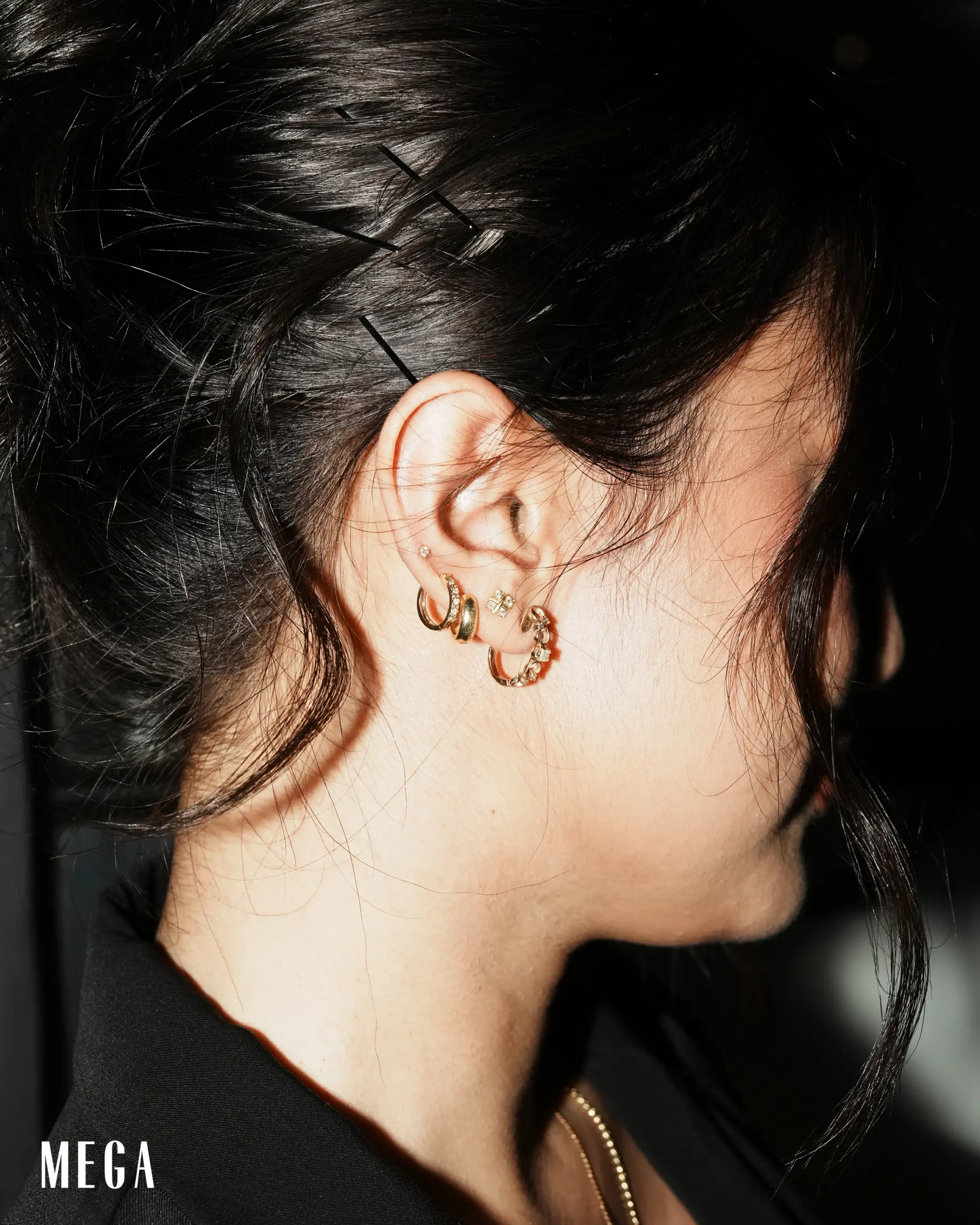 Klyza Castro's earring stack