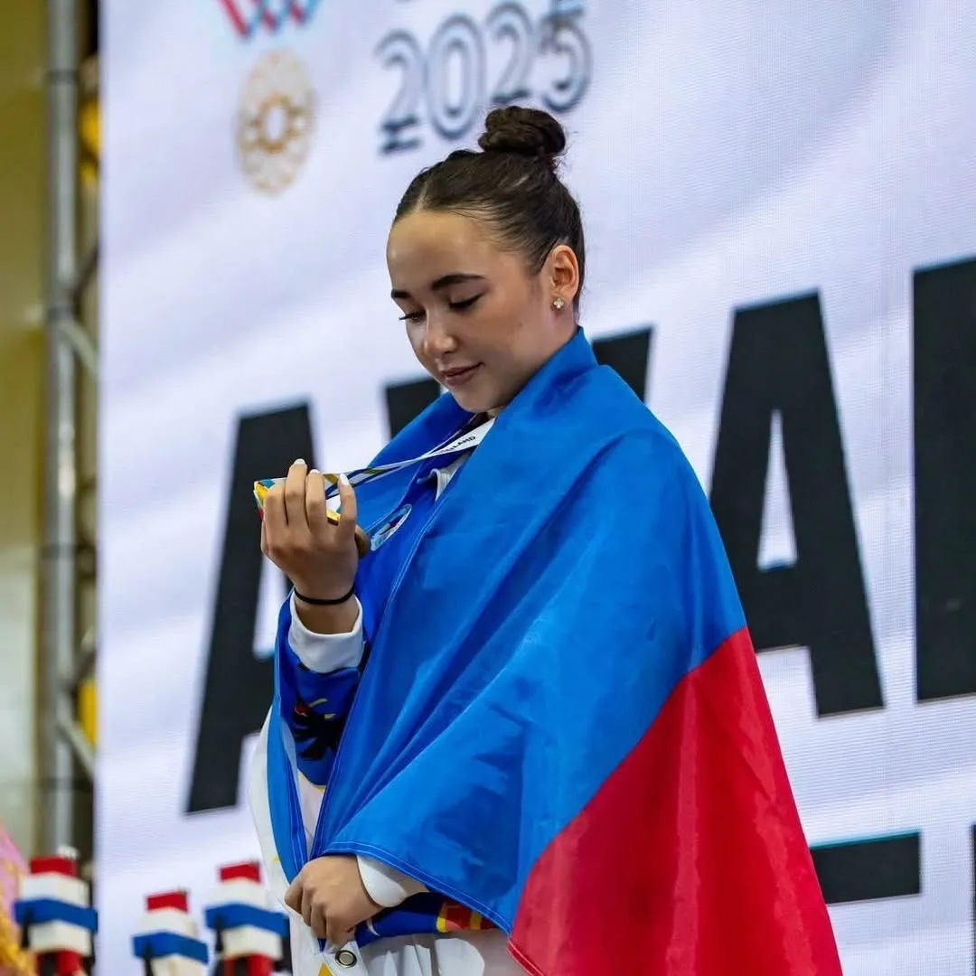 A VAULT WIN WITH A SCORE OF 13.433