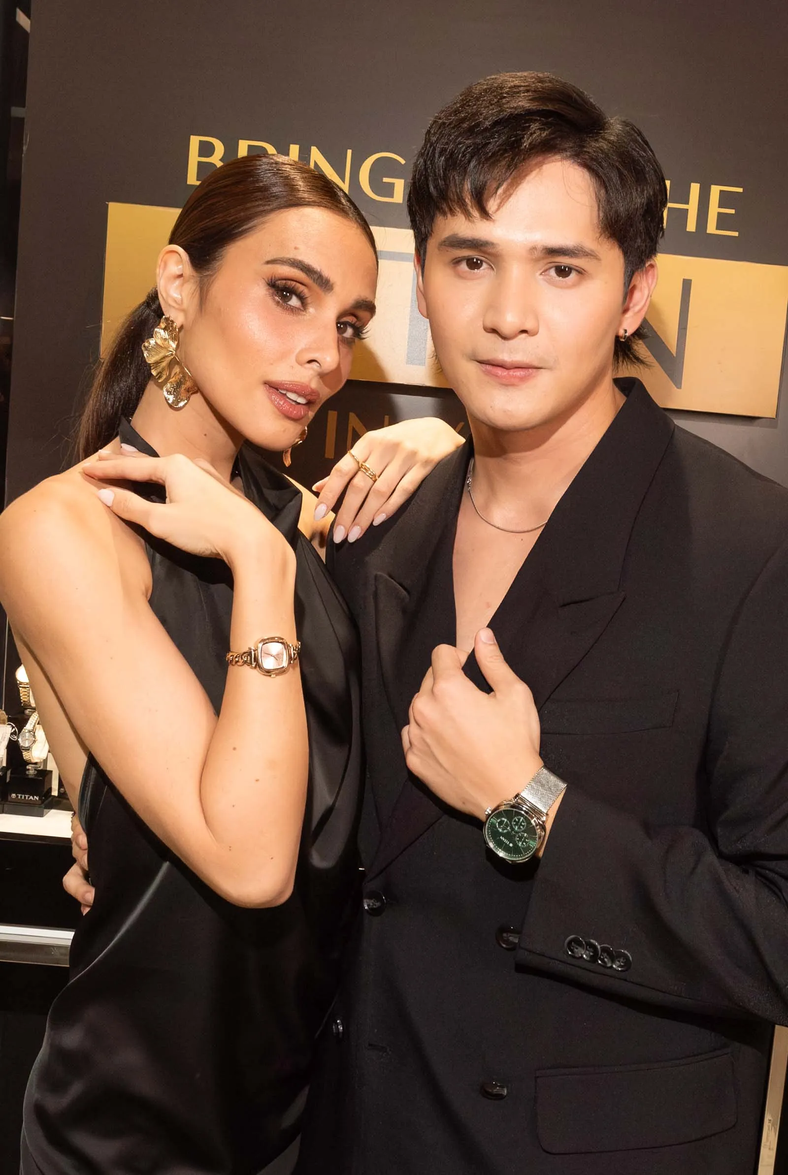 Max and Ruru with their Titan timepieces