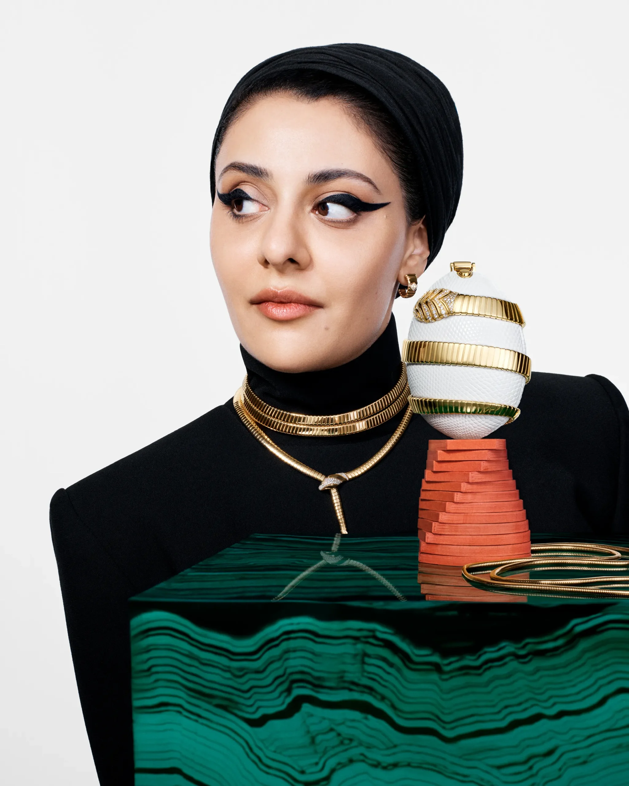 Sumayya Vally WITH THE BVLGARI ICONS Minaudière: Tubogas
