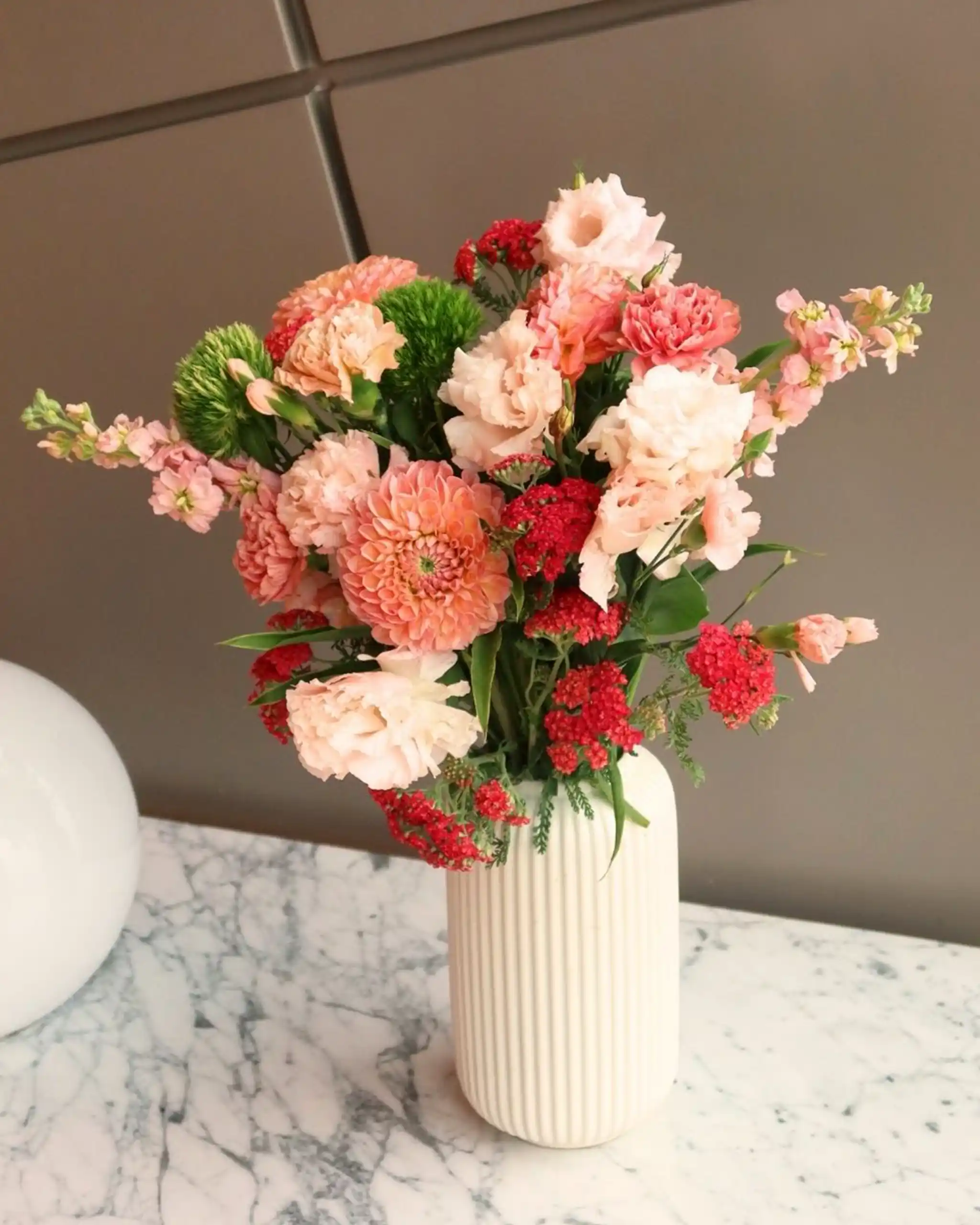 Bloomingnails provides flower delivery, custom floral arrangements for events, and hands-on workshops.