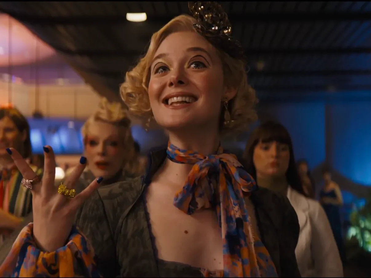 Elle Fanning as Effie trinket