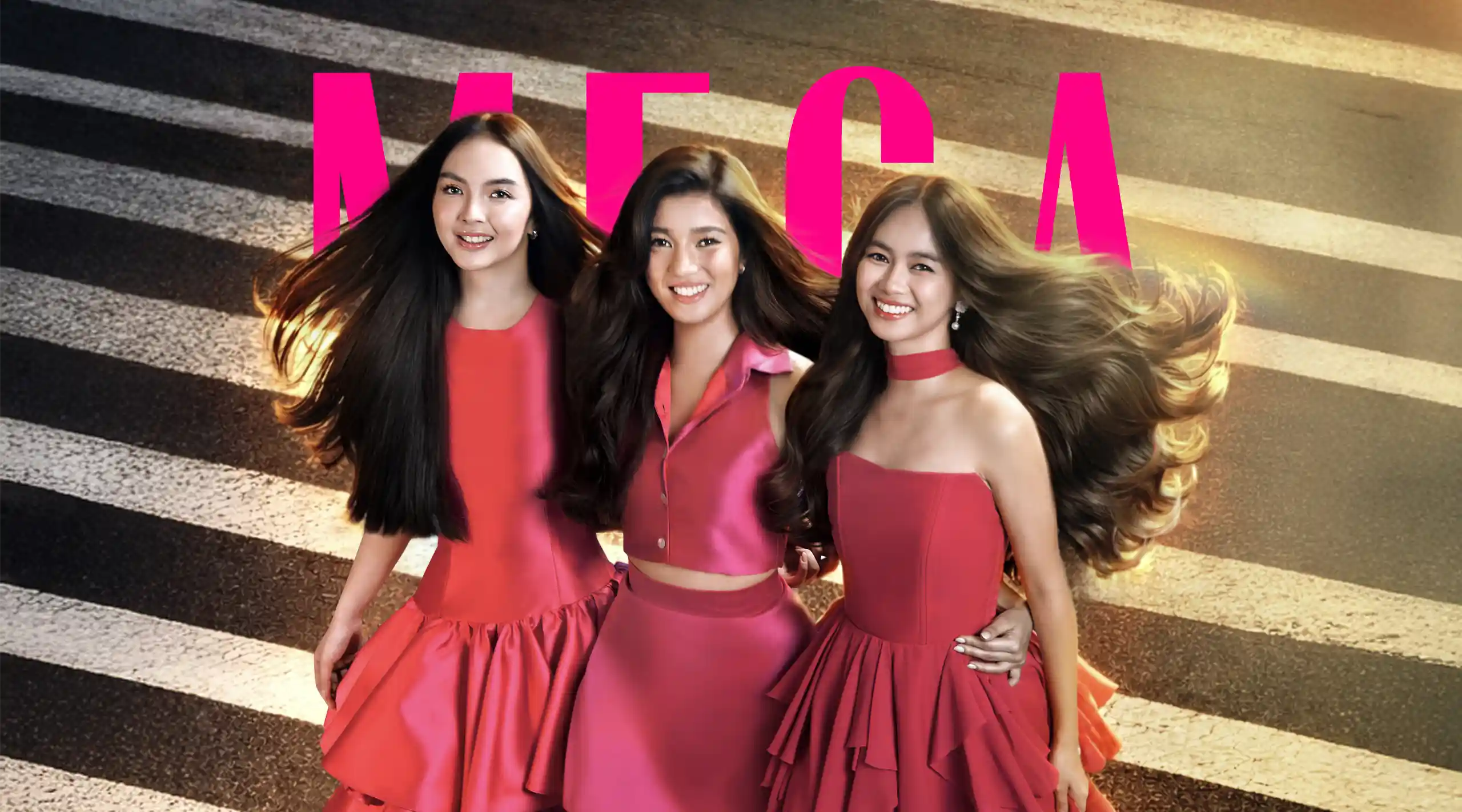 Three women in pink dresses pose together on a zebra-striped crosswalk, with large pink letters visible behind them.