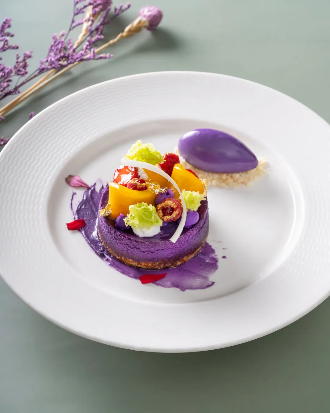 ube cheesecake with ube ice cream quenelle