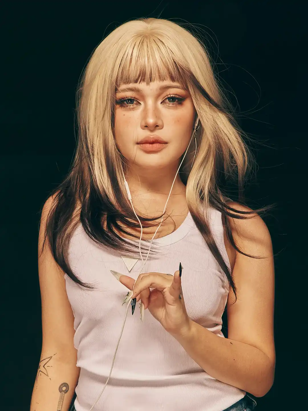 Eight years after her win, Janine Berdin is no longer following anyone else's rules—embracing her rebellious spirit, alternative style, and artistry on her own terms.