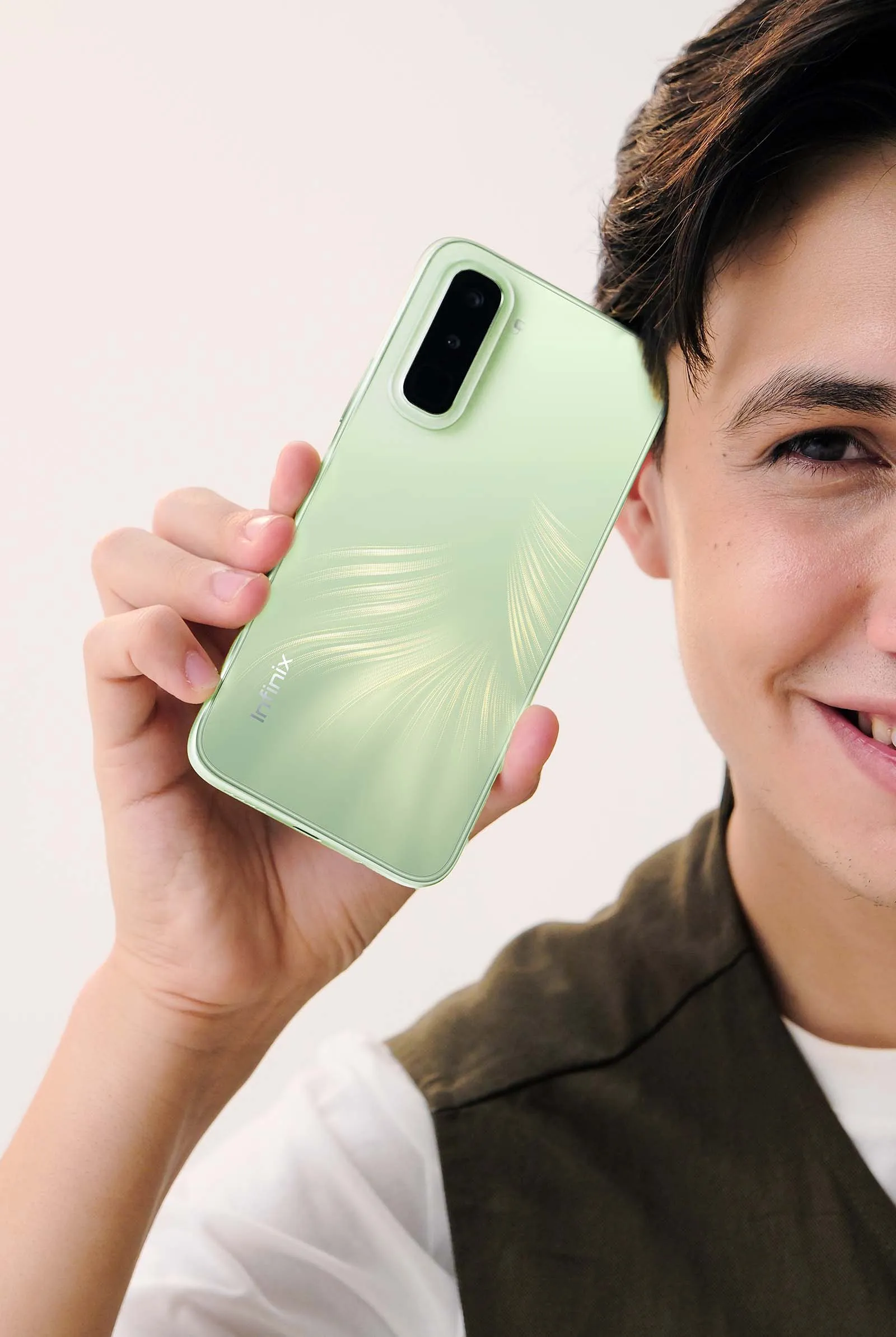 The Infinix HOT 70 Green Texture