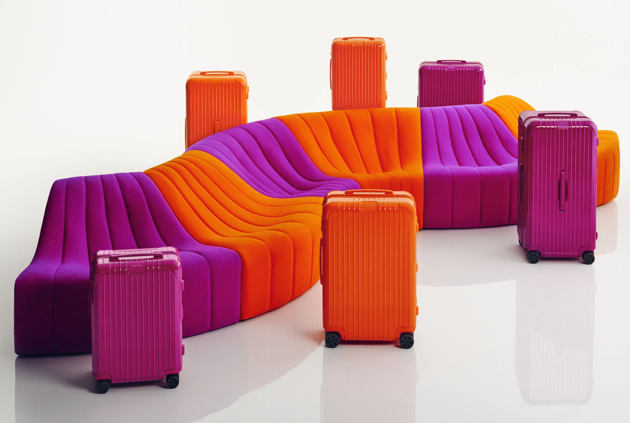 RIMOWA's Orange and Magenta variants