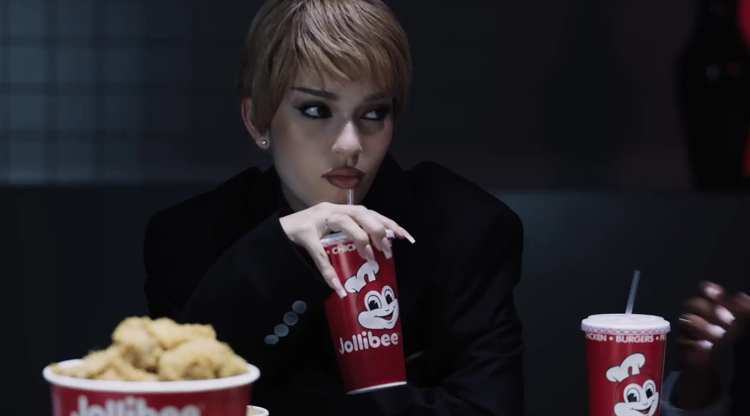 Jollibee is seen in KATSEYE's "Animal" music video